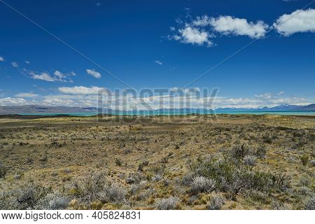 Vast Open Landscape In Patagonia At Turquoise Lago Viedma Close To Fitz Roy Mountain With Snow Cover