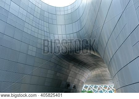 Seoul, South Korea - 28 June 2019: Perforated Facade Cladding Of Dongdaemun Design Plaza Or Ddp