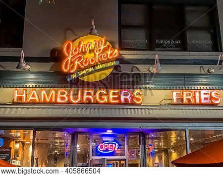 The Johnny Rockets Logo And Banner With An Outer Glow Effect That Draws A Lot Attention At Night. Ho