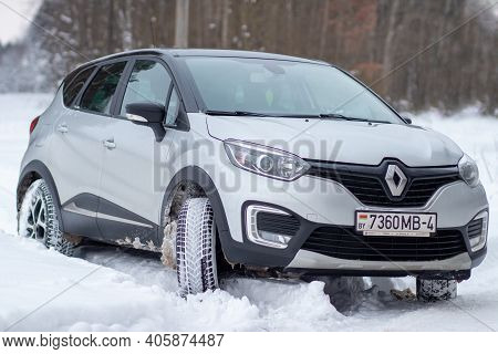 Grodno, Belarus-01.31.2021: Renault Capture Or Renault Captur Suv On A Winter Road Against The Backg