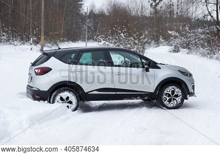 Grodno, Belarus-01.31.2021: Side View Of A Renault Capture Or Renault Captur Suv On A Winter Road Ag