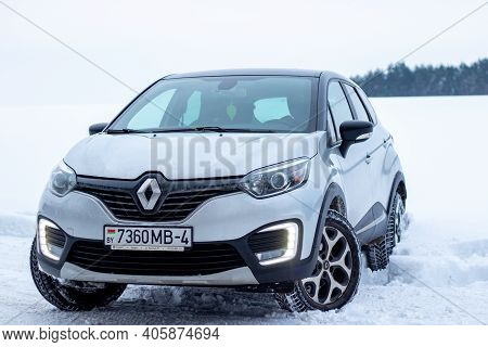 Grodno, Belarus-01.31.2021: Renault Capture Or Renault Captur Suv On A Winter Road Against The Backg