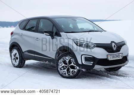 Grodno, Belarus-01.31.2021: Renault Capture Or Renault Captur Suv On A Winter Road Against The Backg