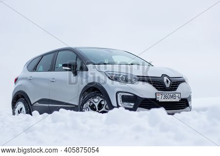 Grodno, Belarus-01.31.2021: Renault Capture Or Renault Captur Suv On A Winter Road Against The Backg