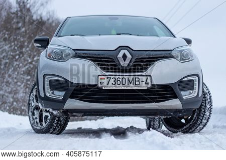 Grodno, Belarus-01.31.2021: Renault Capture Or Renault Captur Suv On A Winter Road Against The Backg