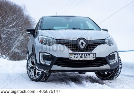 Grodno, Belarus-01.31.2021: Renault Capture Or Renault Captur Suv On A Winter Road Against The Backg