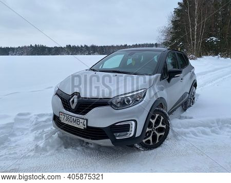Grodno, Belarus-01.31.2021: Renault Capture Or Renault Captur Suv On A Winter Road Against The Backg
