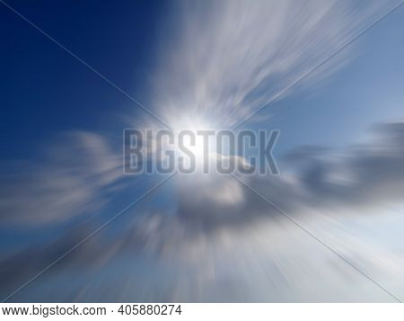 Blue Sky With Sun Light And Rushing Clouds Background. Inspirational Backgrounds With Copy Space.