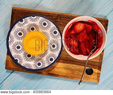 Glazed Strawberries Are Ready To Spoon Onto A Desset Cake.