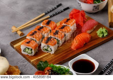 Philadelphia Roll With Cucumber And Sushi With Salmon And Tuna. Sushi Menu. Japanese Food.