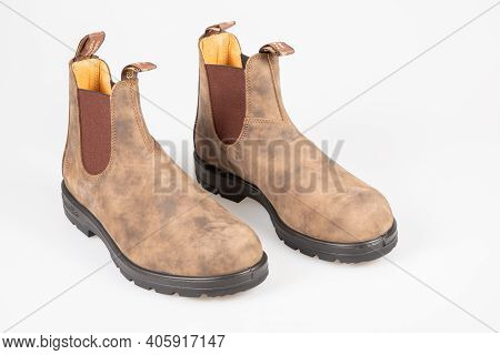 Bordeaux , Aquitaine  France - 01 24 2021 : Blundstone Brown Pair Of Shoes Working Boots On White Ba