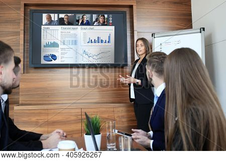Business Team At Office, Businessman Presenting And Discussing Successful Financial Report Of Their 
