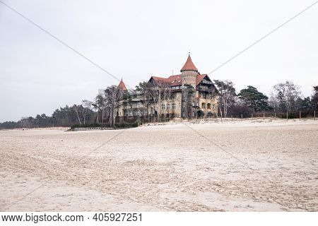 Beautiful Landscape On A Winter Day On The Beach In Łeba In Poland With A Historic Hotel