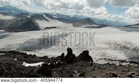 Aerial View Of Massive Snow Mountain Range In And Snowy Valley. Clip. Breathtaking Landscape With Sn