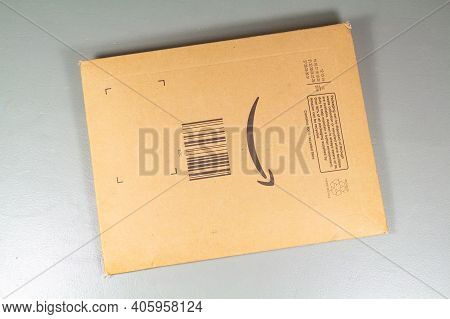 Primelin - France, January 08, 2020 : Amazon Package In Cardboard