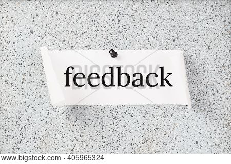 Feedback Text On A Grey Notice Board