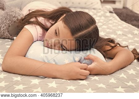 Sleepy Beauty. Sleepy Baby. Small Girl Relax In Bed. Little Child With Sleepy Look. Early Morning Or