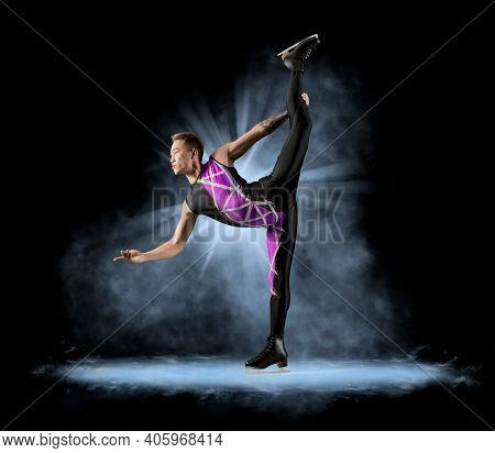 Biellmann spin. Man figure skating in action. Sports banner. Horizontal copy space background