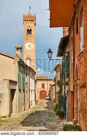 Old street with old bell tower in Santarcangelo di Romagna town, Rimini province, Italy