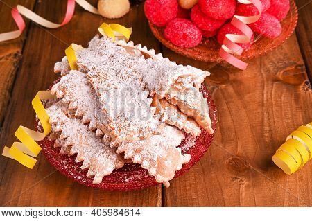 Carnival Typical Food And Confetti. Sfrappole Or Chiachiere Or Angel Wings And Aromatic Coffee On A 