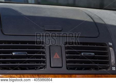 Ventilation Vents With Air Flow Deflectors And Car Emergency Lights Button Between Them. Fragment Of