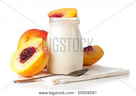 Jar Of Yogurt And Sliced nectarines