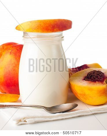 Jar Of Yogurt And Sliced Nectarines