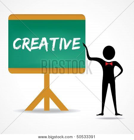Man points to creative word on green board
