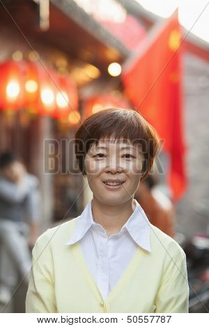 Portrait Of Mature Woman In Houhai, Beijing