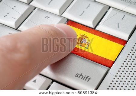 Business Concept Male Finger Pressing Spain Enter Key