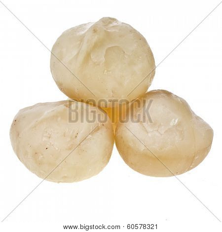 macadamia nuts isolated on white background 