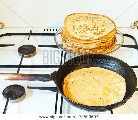 Baked Pancake And Stack Of Prepared Pancakes