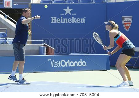 Four times Grand Slam champion Maria Sharapova practices with her coach Sven Groeneveld for US Open