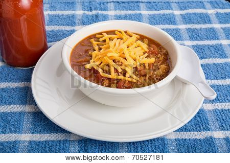 Chili With Cheese And Hot Sauce