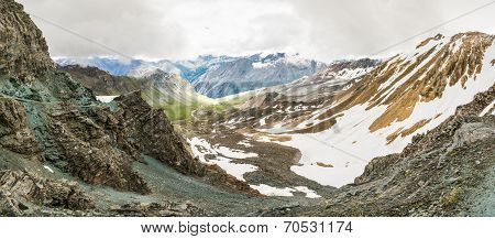 Panoramic View Of A Mountain Valley From A Ridge
