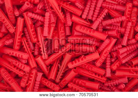 Red plastic dowels.
