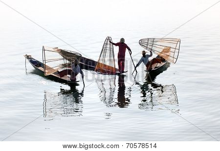 Traveling to Myanmar, outdoor photography of fisherman on traditional boat. Intha people from Shan state of Burma 