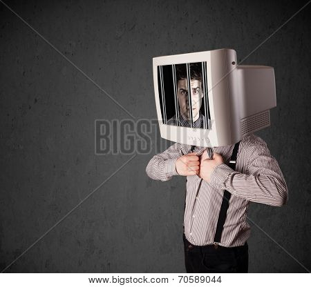 Business man with monitor screen on his head traped into a digital system concept