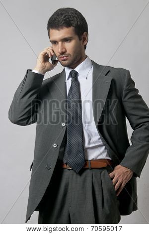 Businessman Using a Cellphone - Isolated