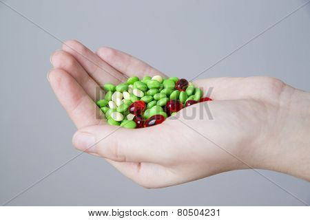 Pills In Women Hand