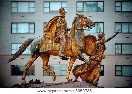Street view with statue in Midtown Manhattan