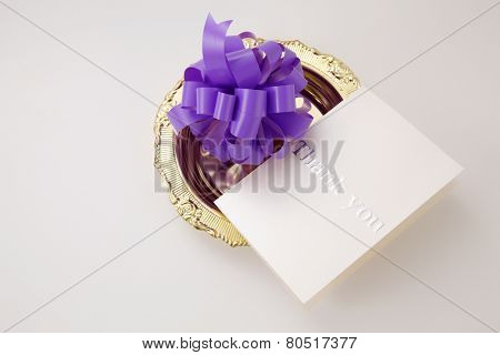 opening ceremony concept, purple bows on the silver plate