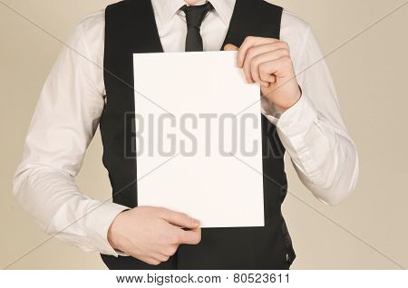 business man holding a poster. place for text. template for text.