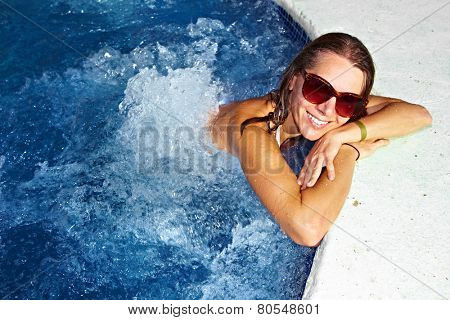 Beautiful girl relaxing in . Spa background