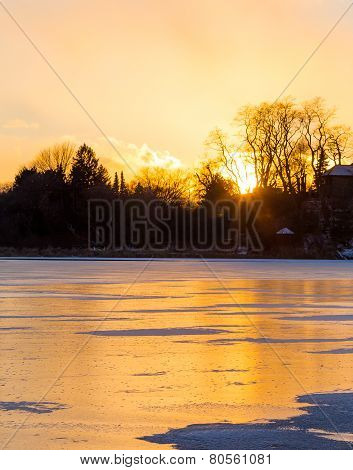 Frozen Lake At Sunset