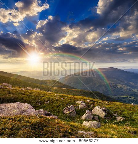 Mountain Hillside With White Boulders At Sunset