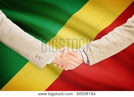 Businessmen Handshake With Flag On Background - Republic Of The Congo - Congo-brazzaville