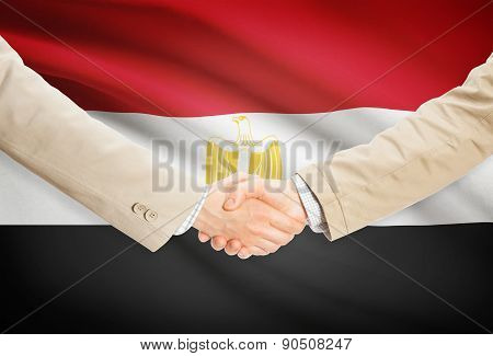 Businessmen Handshake With Flag On Background - Egypt