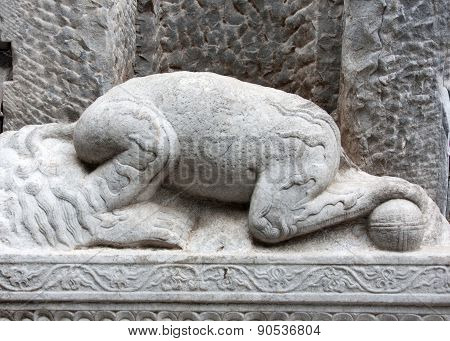 Antique stone figure with head stolen