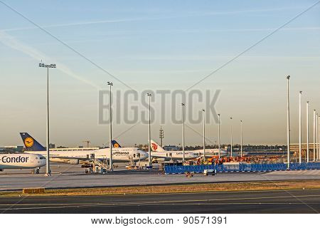 Aircrafts At Lufthansa Technik Wharft At Rhein Main Airport In Sunrise